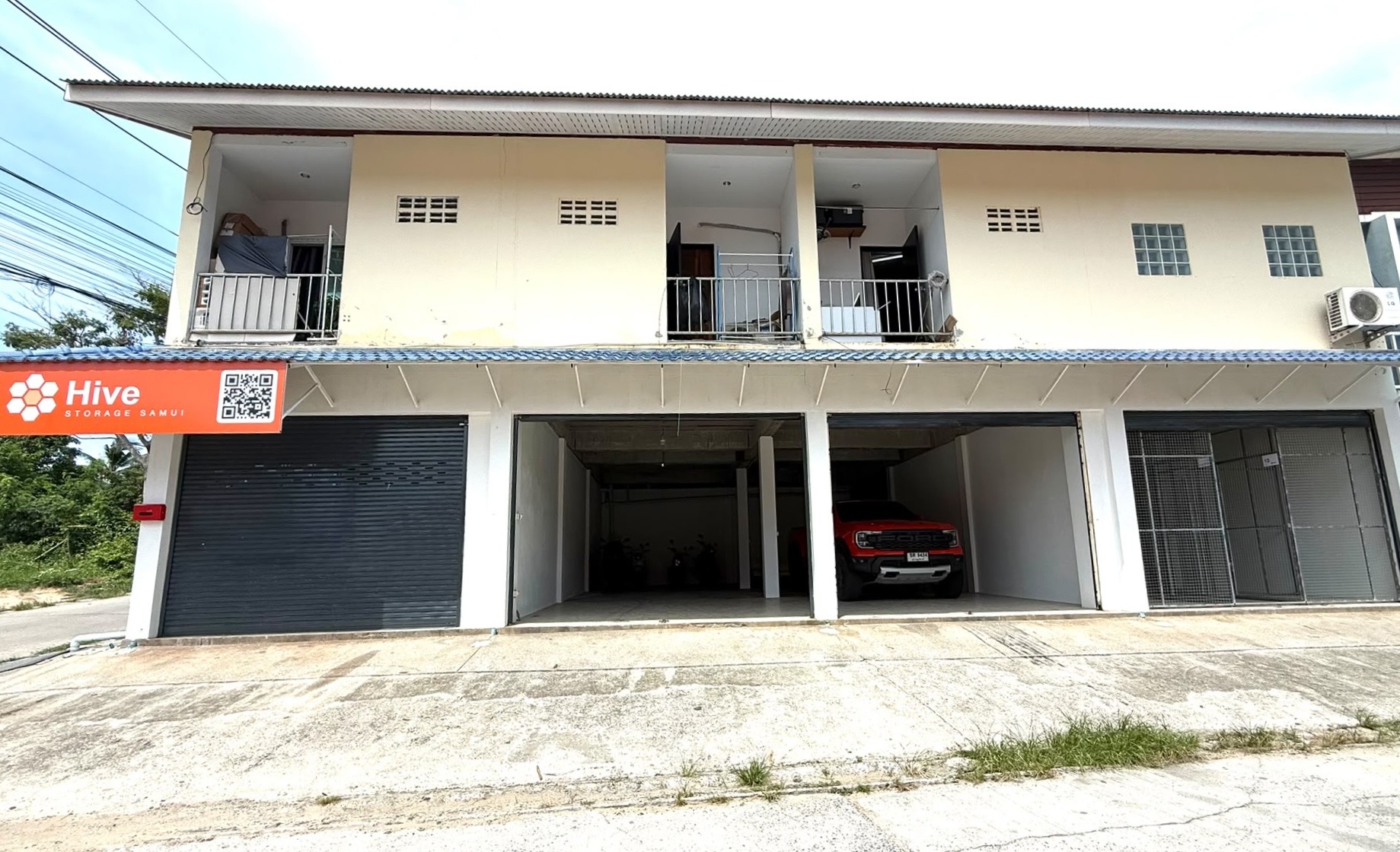 Hive Storage Samui — orange branded facade on the east coast